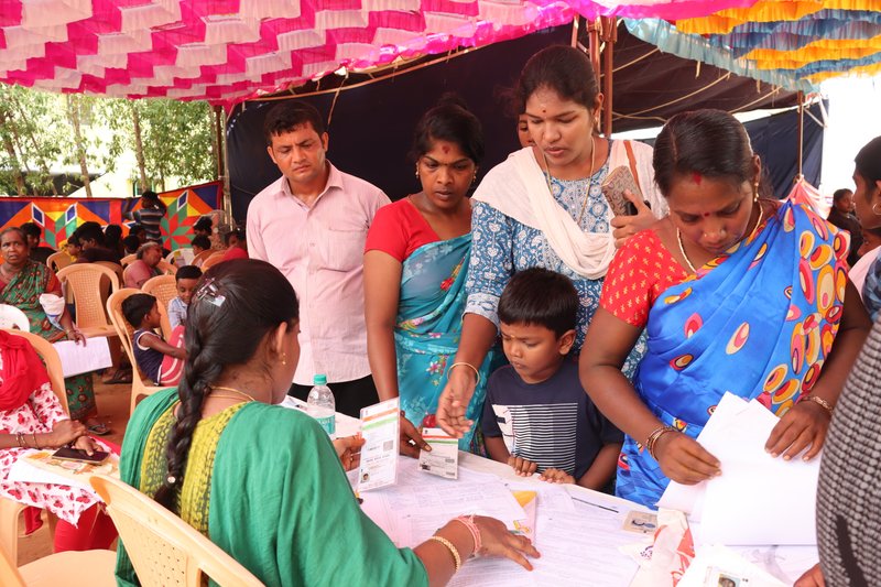 Staff assisting residents